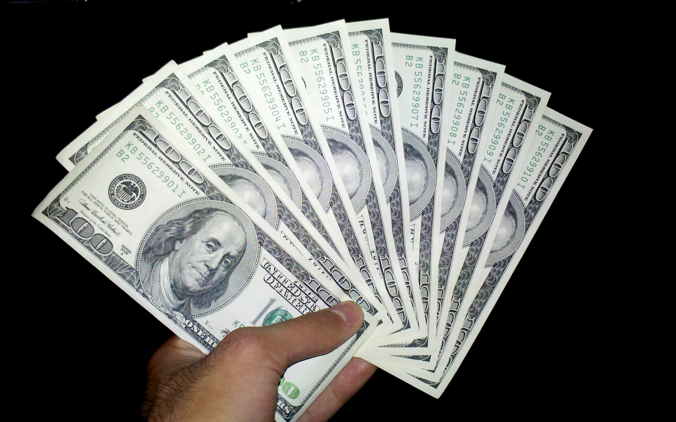 Us_dollars_one_hundred_banknotes.jpg