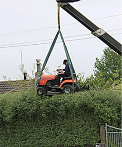 Lawn-mower-crane-hedge-trim.jpg