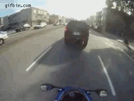 1305799203_biker_is_hit_from_behind.gif