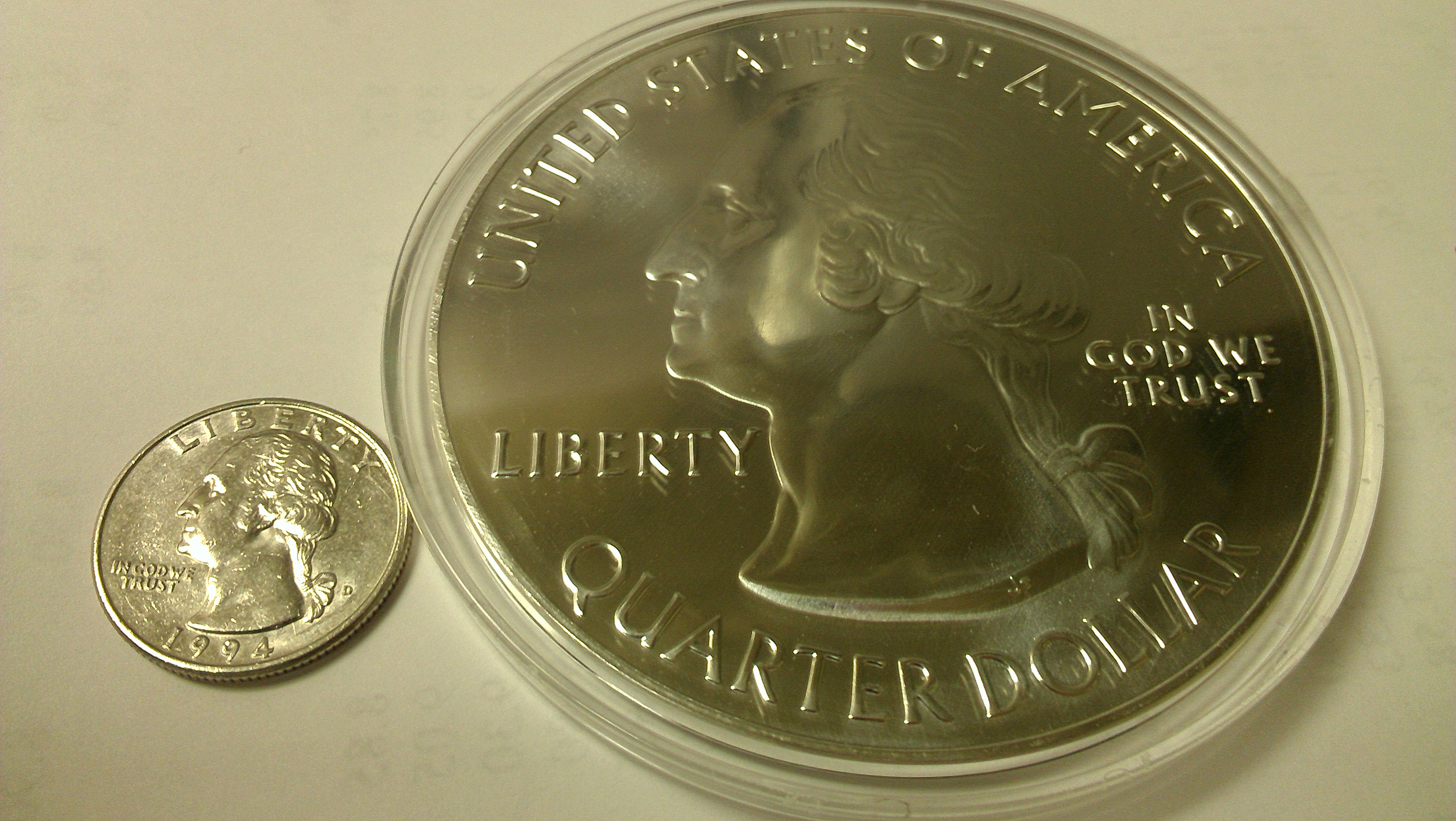 5oz_America_the_Beautiful_Bullion_(comparison).jpg