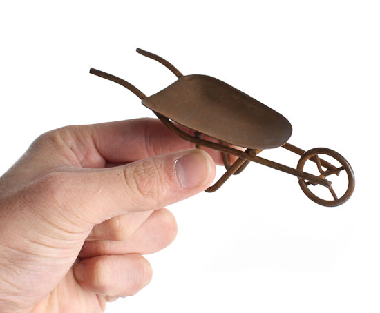 miniature_rusty_tin_wheelbarrow_1.jpg