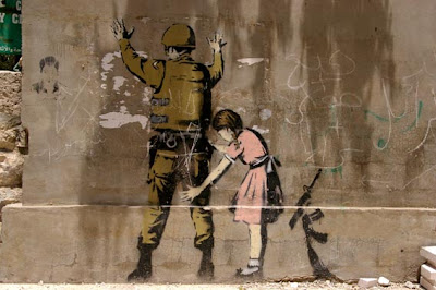 Banksy+girl.JPG
